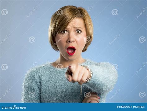 Beautiful Blond Woman In Surprise And Shock Face Expression Expressing Anxiety And Fear Stock