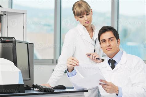 science people in bright lab 10389369 Stock Photo at Vecteezy
