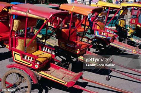 Human Powered Rickshaw Photos And Premium High Res Pictures Getty Images