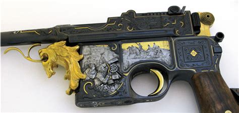 C96 "Boomhandle" Mauser, heavily engraved & sculpted [998 x 474] : GunPorn
