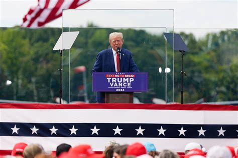 Trump Speaks From Behind Bulletproof Glass At First Outdoor Rally Since