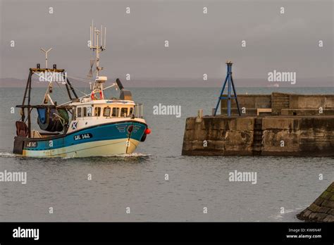 Trawler Returning To Port Hi Res Stock Photography And Images Alamy