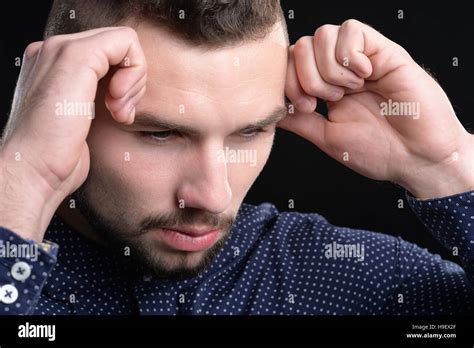 Thoughtful Young Man Stock Photo Alamy