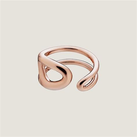 A Rose Gold Ring With An Intertwined Design