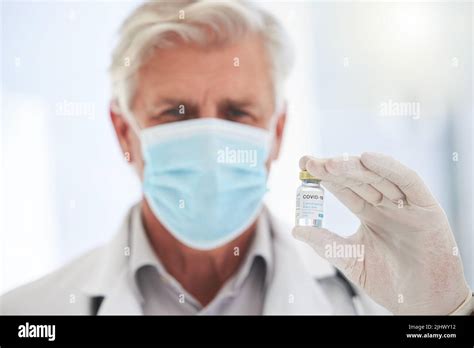 Prevent The Risk By Protecting Yourself A Mature Doctor Holding A