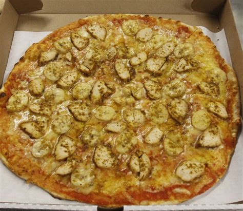 This is Swedish pizza. Banana and chicken on cheese and tomato sauce ...