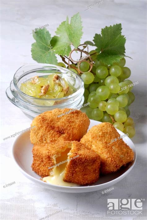 Camembert croquettes with stewed grapes and walnuts, Stock Photo, Picture And Royalty Free Image ...