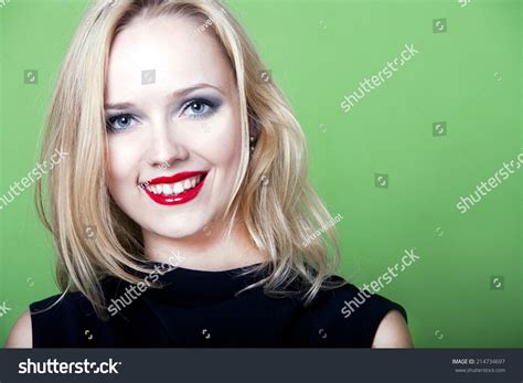 Sexy Blonde Woman On Green Background Stock Photo 214734697 Shutterstock