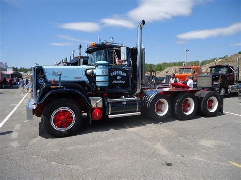 A Large Semi Truck Parked In A Parking Lot