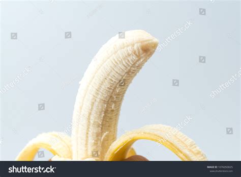 Human Hand Holding Banana Fruit Nutrition Stock Photo 1076050025