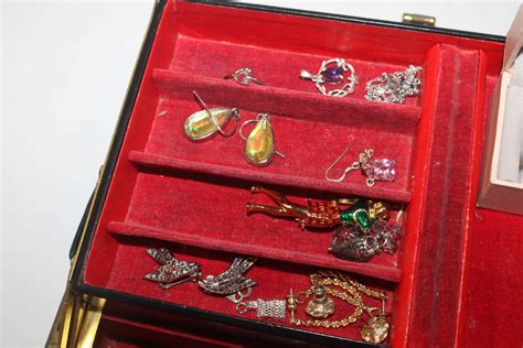 A Cantilever Jewellery Box And Contents Of Jewellery To Include Dress