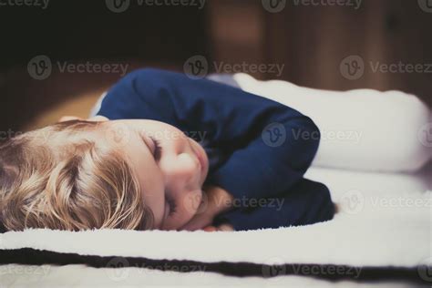 Small Boy Taking A Nap In The Bedroom 20502982 Stock Photo At Vecteezy