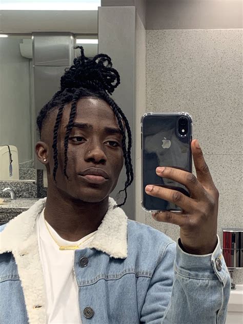 Stylists argue whether man bun hairstyles for men are still cool 1