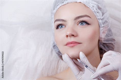 The Doctor Cosmetologist Makes The Rejuvenating Facial Injections