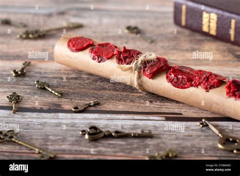 Scroll With Seven Wax Seals And Ancient Keys On Wood With Closed Holy