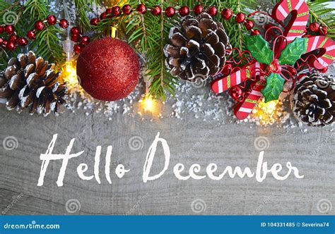 Hello December Message With Car Carrying A Christmas Tree Stock Image