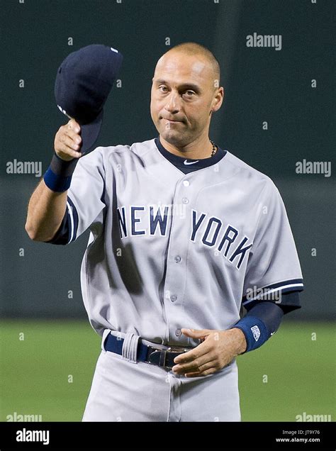 New York Yankees Shortstop Derek Jeter 2 Tips His Cap To Acknowledge