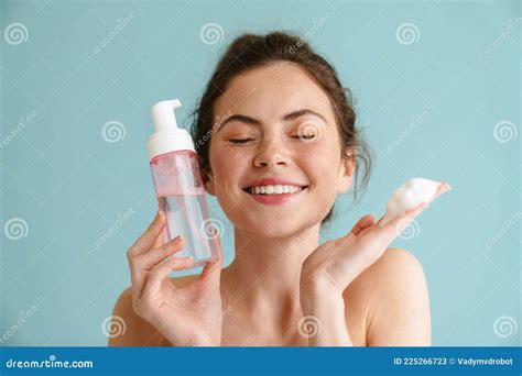 Half Naked Brunette Woman Smiling While Showing Cleaning Foam Stock