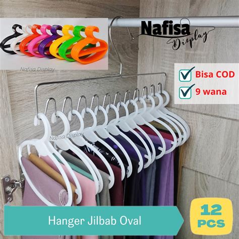 Jual Gantungan Jilbab Oval Lusin Hanger Plastik Display Hijab Nafisa