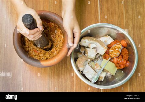 Traditional Thai Food With Lady Crushing Ingredient In Rock Pot Stock