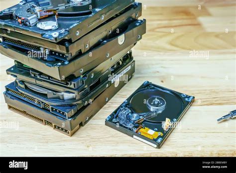 Hard Disk Drive Removable Case For Repair On The Wooden Desk Stock