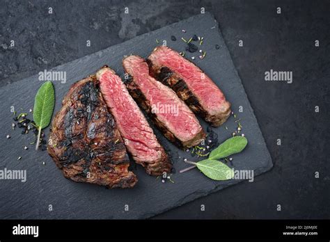 Barbecue Dry Aged Wagyu Rib Eye Beef Steaks With Herb And Black Salt