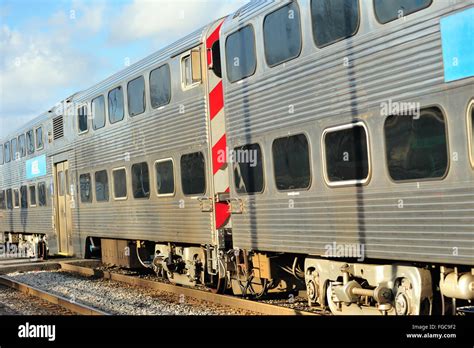 A Metra Commuter Train Departing From The National Street Station In