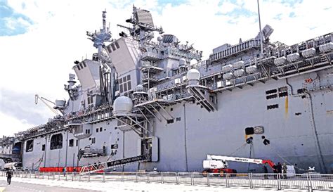 The Us Navys Uss Tripoli Lha 7 Amphibious Assault Ship Is Seen Docked At Australias Fleet