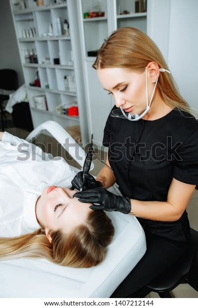 Master Beautician Blonde Bent Over Lying Stock Photo