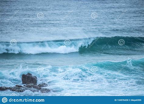 Waves Crashing Into Rocks Stock Photo Image Of Blue 134976430