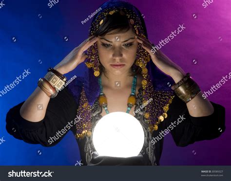 Gypsy Fortune-Teller Uses A Crystal Ball To Foretell The Future Stock ...