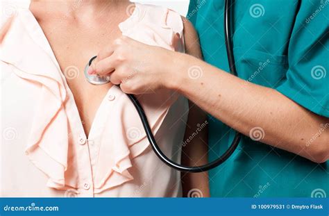 Doctor Checking Heart Beat Of Patient In Hospital Stock Image Image