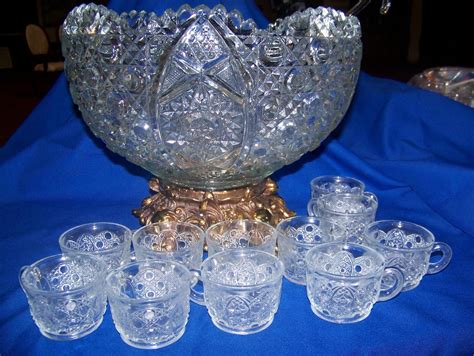 Vintage cut crystal punch bowl, eleven matching crystal glasses