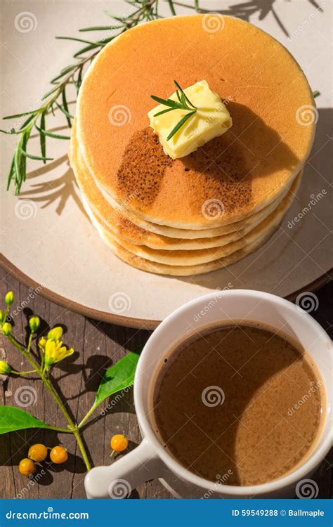 Stack Of Delicious Pancake Topped With Butter And Maple Syrup Wit Stock