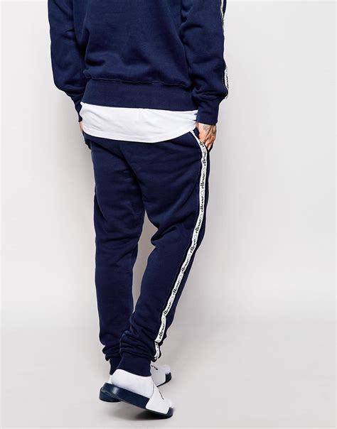 Lyst Ellesse Skinny Joggers With Taping In Blue For Men