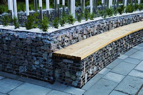 Gabion Retaining Walls Wooden Benches Built Into A Dry Wall In The