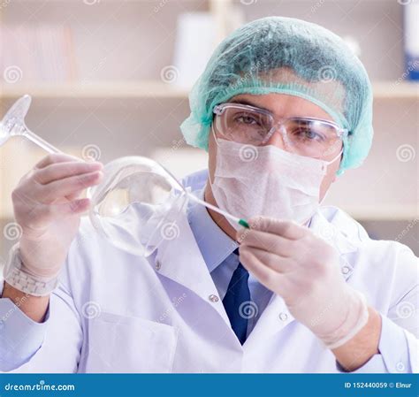 Forensics Investigator Working In Lab On Crime Evidence Stock Image