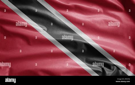 Trinidadian And Tobagonian Flag Waving In The Wind Close Up Of