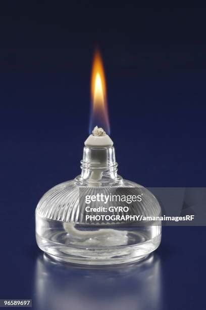 alcohol lamp stock  high res pictures  images getty images