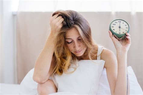 Shocked Young Woman Waking Up With Alarm Stock Photo Image Of Shock