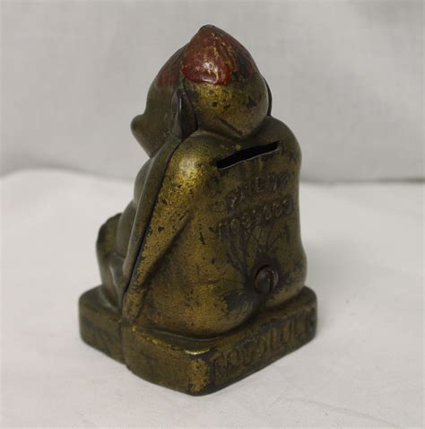 Bargain Johns Antiques Billiken Antique Cast Iron Still Bank