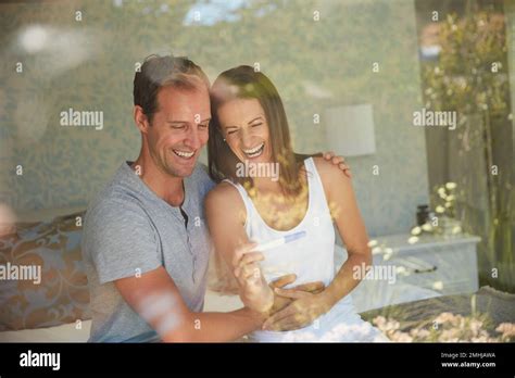 Theyre So Thrilled To Be Parents Soon A Mature Couple Feeling Excited After Taking A Home