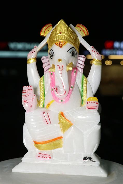 Handmade White Marble Ganesha Sculpture Radiating Elegance And Grace