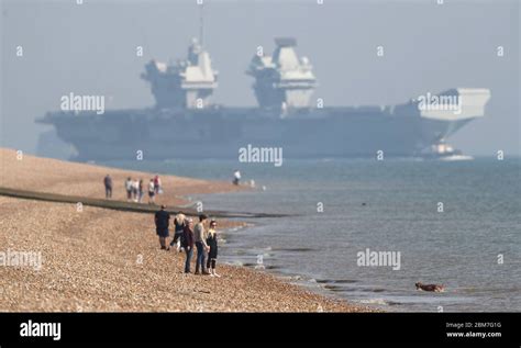 The Royal Navy Aircraft Carrier Hms Queen Elizabeth Sails Into Stokes