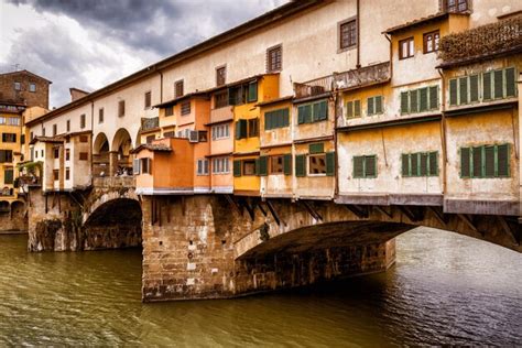 Premium Photo Ponte Vecchio Bridge Over Arno River In Florence