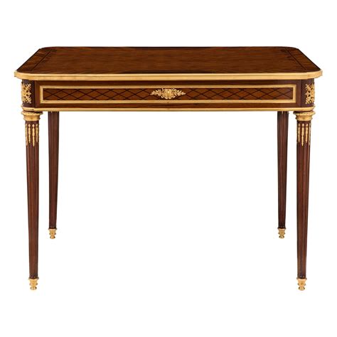 19th Century Louis XVI Style Ormolu Mounted Mahogany And Kingwood