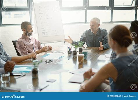 Do You Understand A Group Of Businesspeople Meeting In The Boardroom