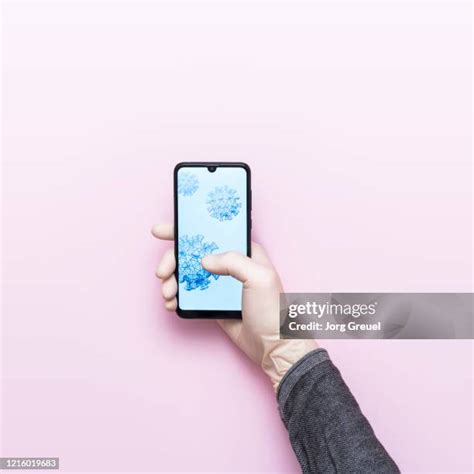Latex Glove Holding Phone Photos And Premium High Res Pictures Getty