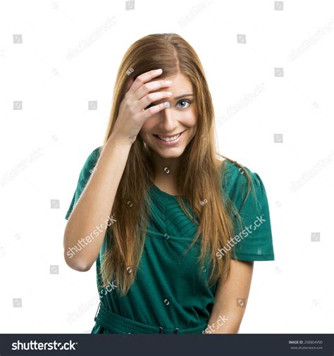 Portrait Of A Beautiful Girl With A Shy Smile Isolated On White