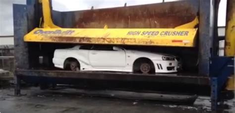 Nissan Skyline Illegally Imported R34 Gets Crushed Flat